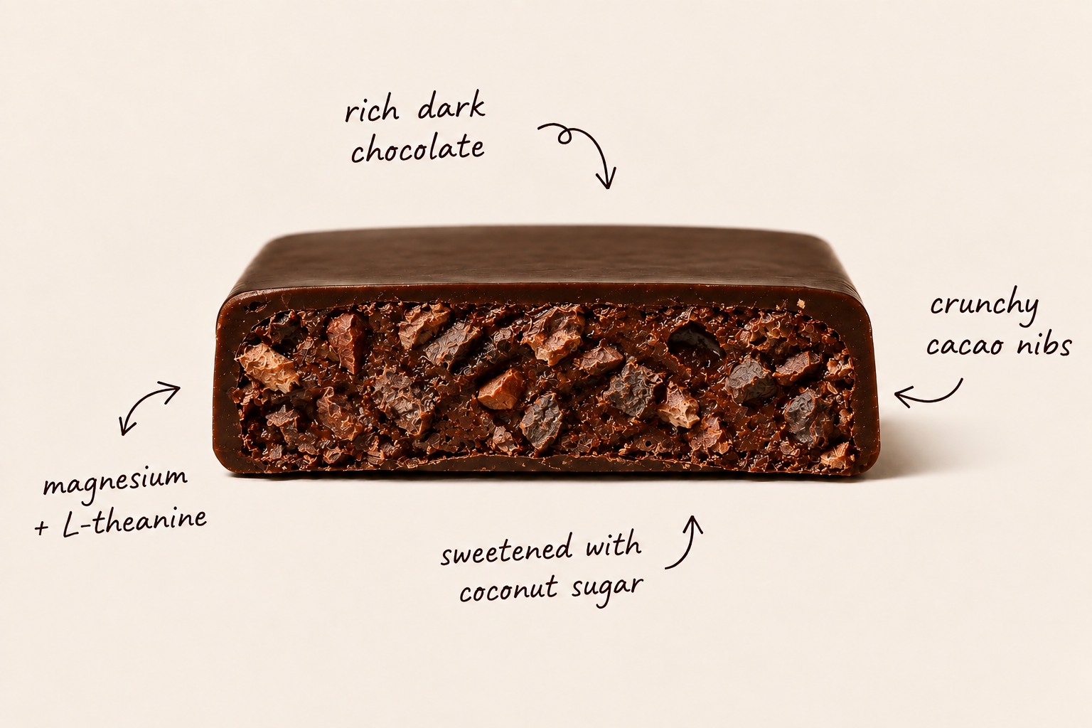 A cross-section of Cūed dark chocolate with crunchy cacao nibs, magnesium and L-theanine, sweetened with coconut sugar
